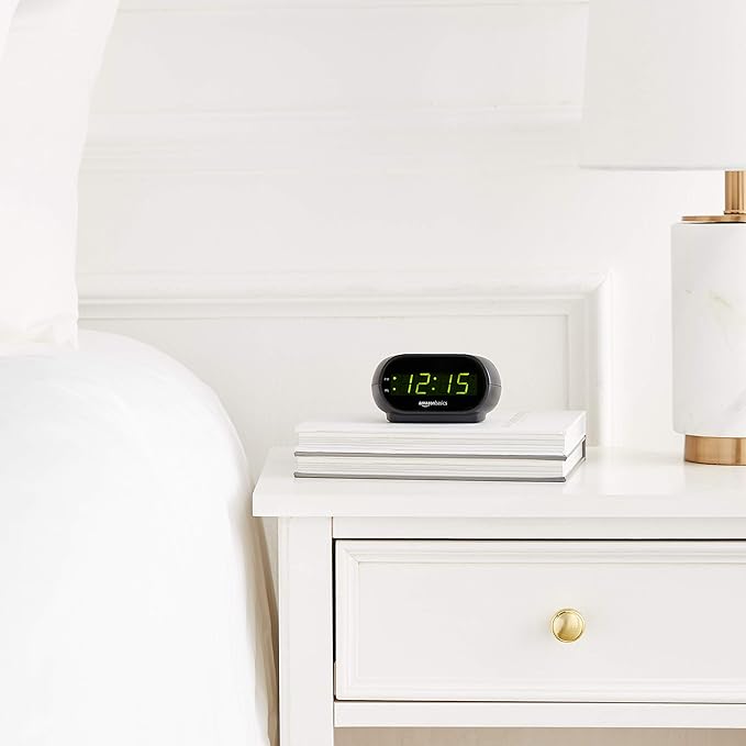 Amazon Basics Small Digital Oval Alarm Clock With LED Display, Nightlight & Battery Backup, Black, 4.5 x 3.5 x 2.4 Inches